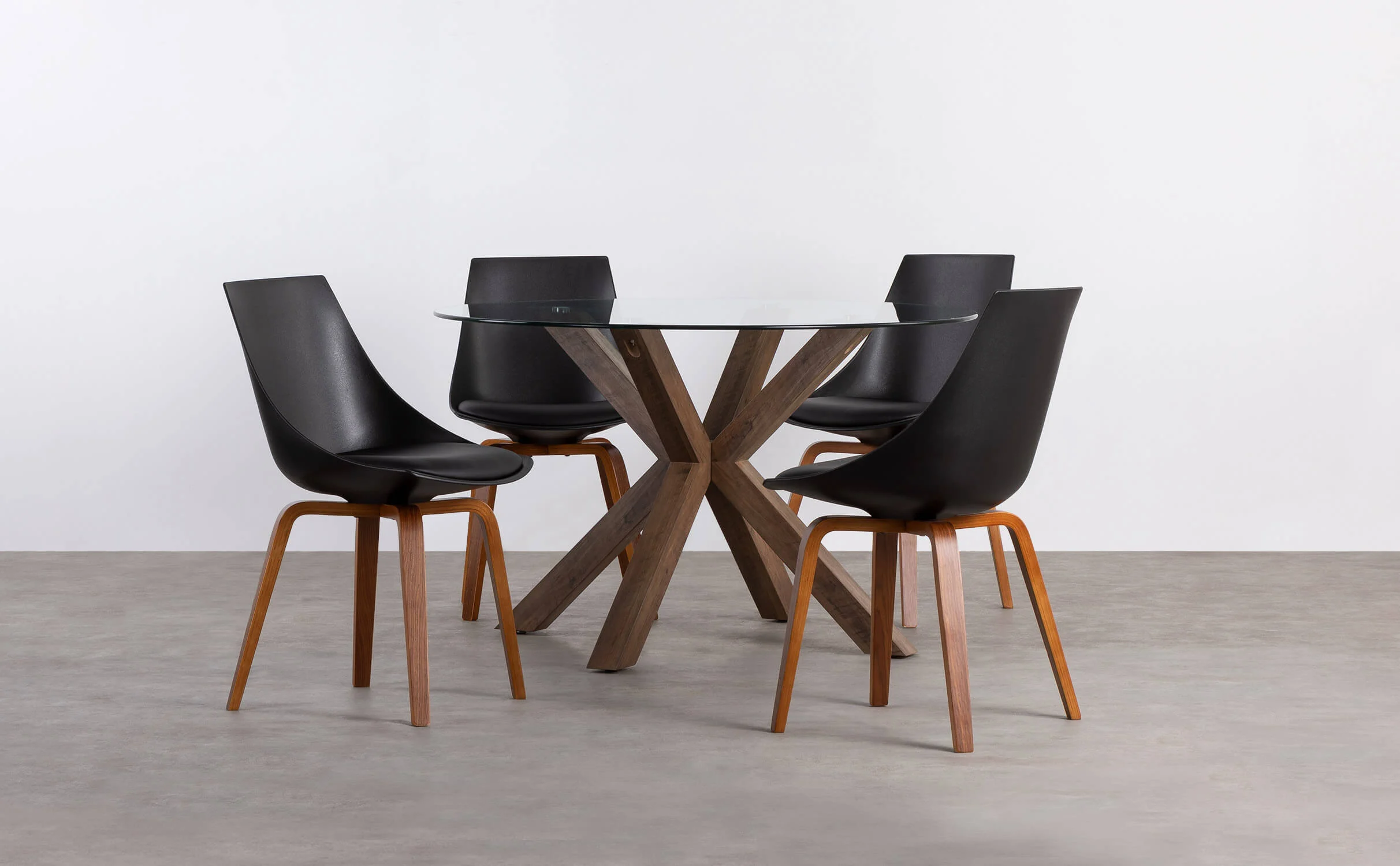 set de mesa redonda de cristal vuoto y 4 sillas de polipropileno stile